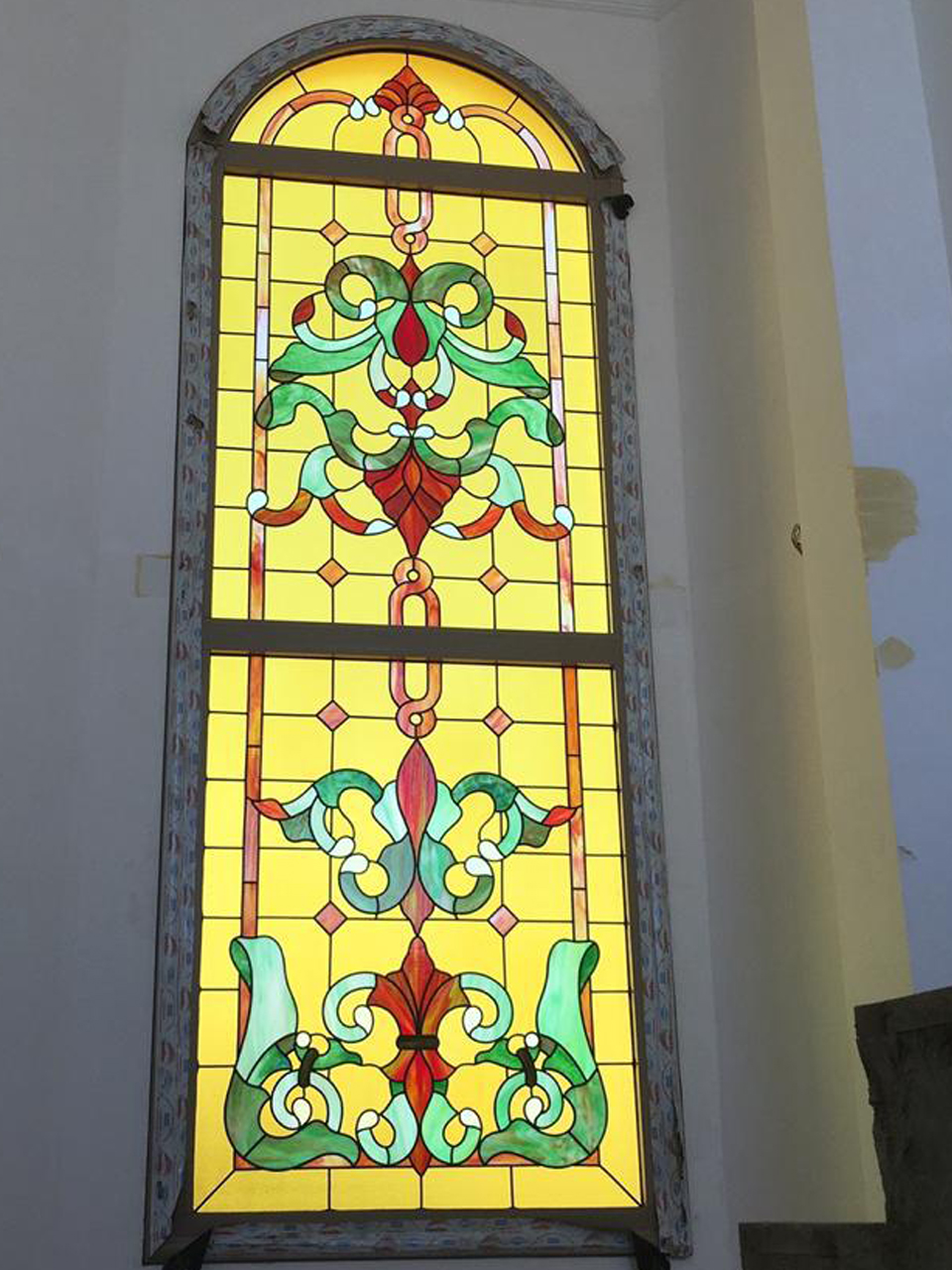 Figural stained glass panel
